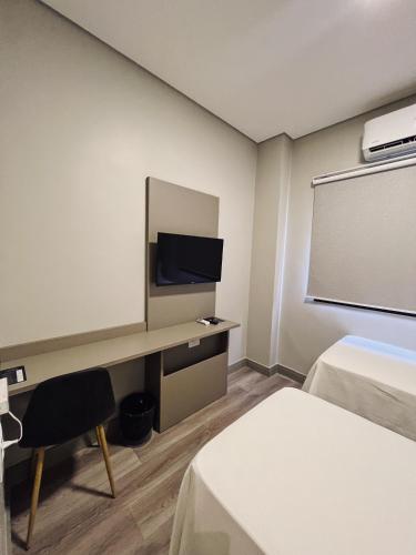 TV a/nebo společenská místnost v ubytování São Pedro Hotel