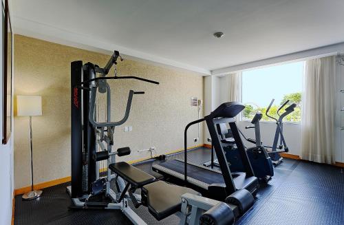 a gym with two tread machines in a room at Holiday Inn Express Villahermosa by IHG in Villahermosa