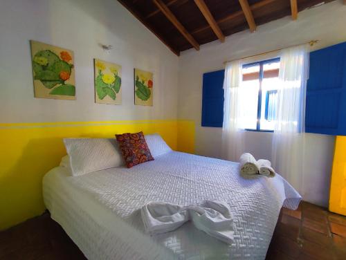 Voodi või voodid majutusasutuse Hostel Trip Monkey Barichara toas