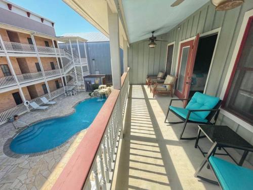 a swimming pool on the balcony of a house at Long Weekend in New Braunfels