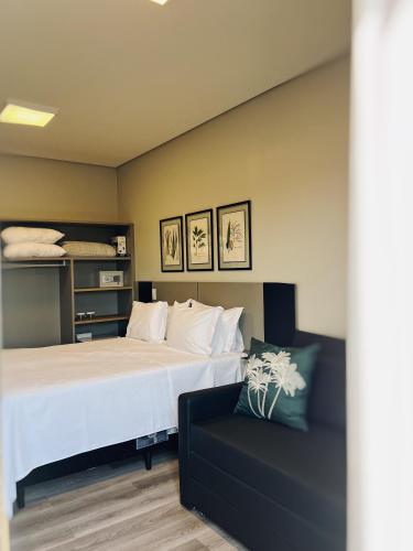 Postel nebo postele na pokoji v ubytování São Pedro Hotel