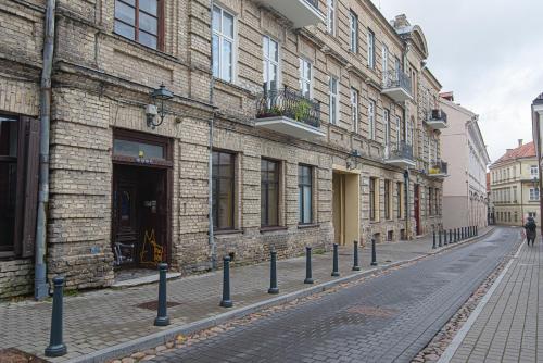 Foto Modern Vilnius Old Town apartment with free parking 6