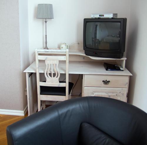 TV a/nebo společenská místnost v ubytování Pensionat Ekholmen