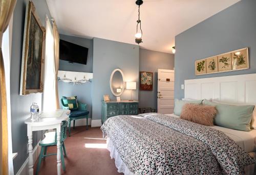Ένα ή περισσότερα κρεβάτια σε δωμάτιο στο Prairie Guest House