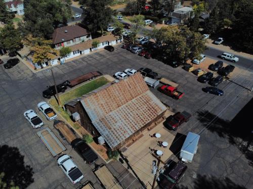 an overhead view of a building with cars parked in a parking lot at Parry Lodge in Kanab