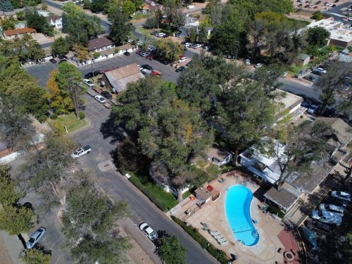 an overhead view of a parking lot with a blue pool at Parry Lodge in Kanab