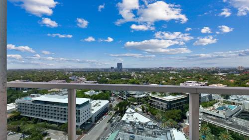 a view of the city from the balcony of a building at Hotel Arya BW Premier Collection in Miami