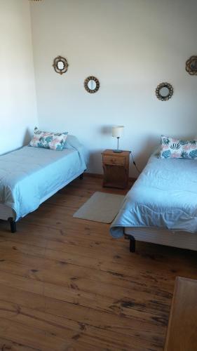 Ένα ή περισσότερα κρεβάτια σε δωμάτιο στο Duplex familiar con pileta en zona parque