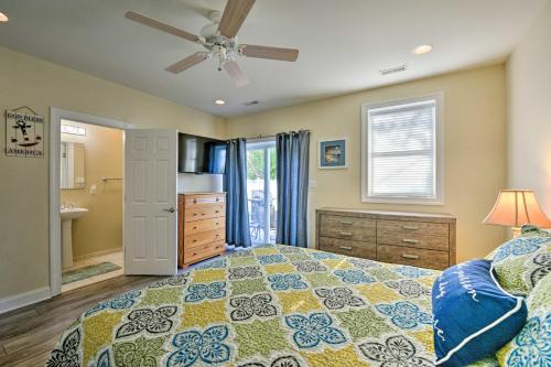 a bedroom with a bed and a ceiling fan at Wildwood Townhome with Patio 1 Block To The Beach! in Wildwood