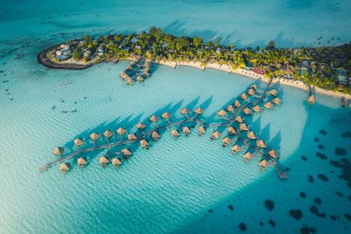 an aerial view of an island in the ocean at InterContinental Bora Bora Le Moana Resort, an IHG Hotel in Bora Bora