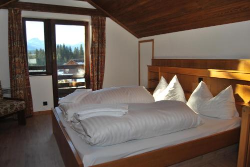 Postel nebo postele na pokoji v ubytování Ferienhaus Pernull