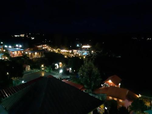 a view of a city at night with lights at ต้นค้อ สวีทโฮม in Khao Kho