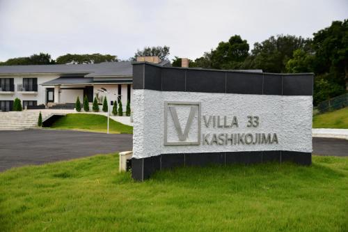 a sign for a villa in kitzkunz at Villa 33 Kashikojima in Ugata