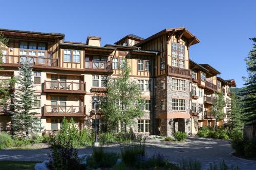 an exterior view of a large apartment building at 1205B - Double Queen Standard Eagle Springs West condo in Solitude