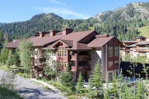 an image of a resort with mountains in the background at 2304- Two Bedroom Deluxe Eagle Springs East Hotel Room in Solitude