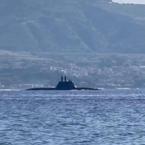 an island in the ocean with a large ship at Casa Azzurra in Messina