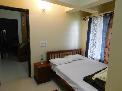 Cauvery Homestayにあるベッド