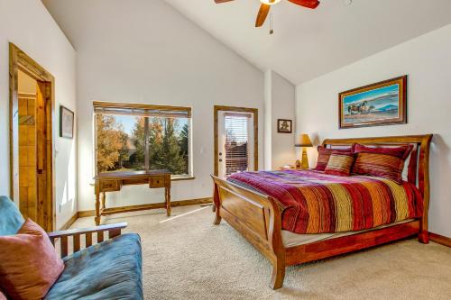 a bedroom with a bed and a window and a couch at Cedar Haven in Park City