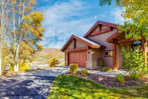 a house with a garage and a driveway at Cedar Haven in Park City