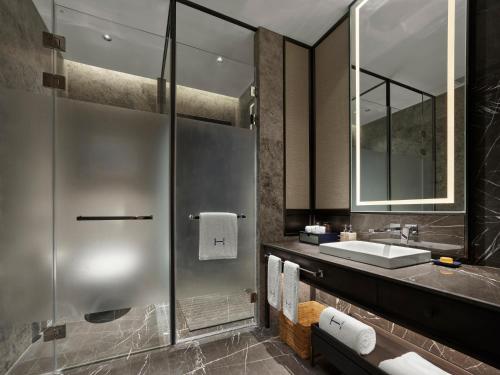 Ein Badezimmer in der Unterkunft HOMM Huzhou Xisai Shan