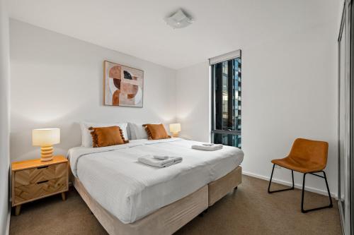 Ένα ή περισσότερα κρεβάτια σε δωμάτιο στο Exclusive Stays - Mainpoint