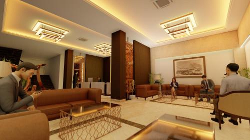 a rendering of a living room with people in it at Enrise by Sayaji Rewa in Rewa