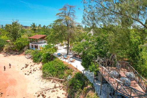 an overhead view of the beach and a resort at The Mida Creek Hotel in Watamu