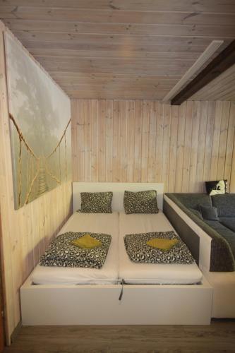a room with two beds in a sauna at Muhlbach 345b in Mühlbach am Hochkönig