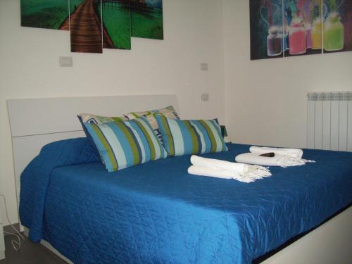 Ένα ή περισσότερα κρεβάτια σε δωμάτιο στο Bed and Breakfast La Palanzana