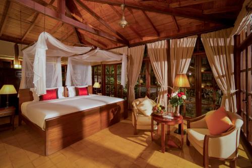 Postel nebo postele na pokoji v ubytování Ana Mandara Villas Dalat Resort & Spa