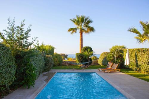 Πισίνα στο ή κοντά στο Villa Mathios