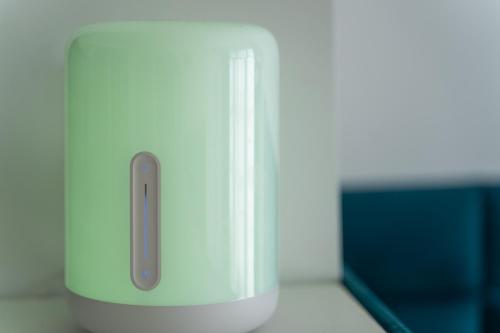 a close up of a white object with a remote control at Hanza Tower 22 WHITE Jacussi & Sauna & Pool & SPA in Szczecin