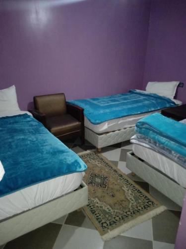 Cama o camas de una habitación en ESPACE INOV IMILCHIL