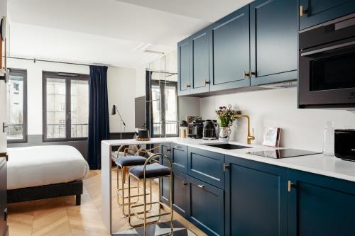 Η κουζίνα ή μικρή κουζίνα στο My Maison In Paris Invalides