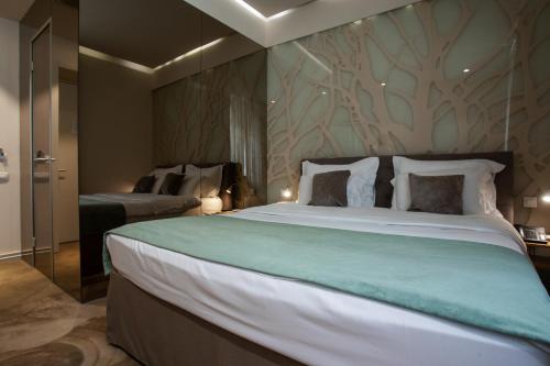 Ένα ή περισσότερα κρεβάτια σε δωμάτιο στο Jump INN Hotel Belgrade