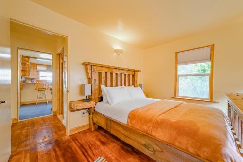 a bedroom with a bed and a window at El Nido The Nest in Arcata