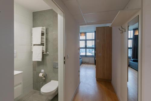 Kúpeľňa v ubytovaní SleepWell Apartments