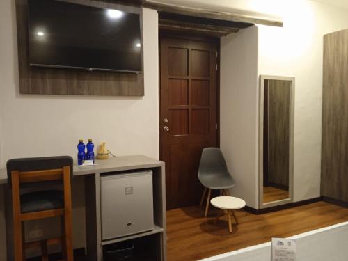 TV a/nebo společenská místnost v ubytování Hotel Raymipampa