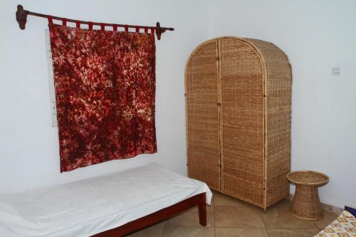 Кровать или кровати в номере Sanchaba Yellow Apartments