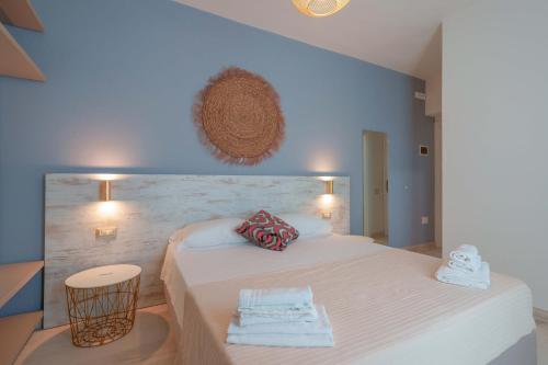 Un ou plusieurs lits dans un hébergement de l'établissement Hotel Maison del Sole