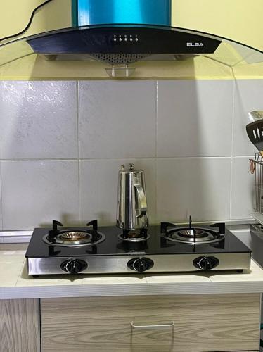 Dapur atau dapur kecil di DinDas Family Stay @ Labuan
