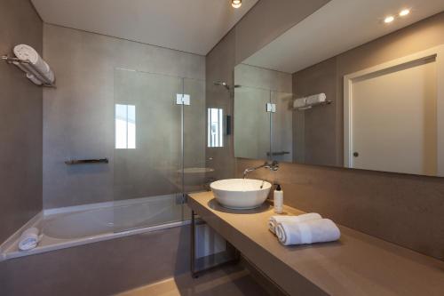 Um banheiro em Avenida Boutique Hotel