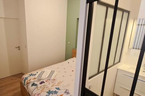 Postel nebo postele na pokoji v ubytování Appartement neuf au cœur de La Rochelle