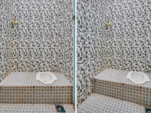 a bathroom with a shower with a toilet in it at SPOT ON 91834 Sg 99 Homestay Syariah in Parit