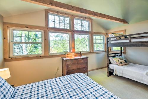 a bedroom with two bunk beds and a desk and a bunk bed at Private Sunapee Getaway 2 Mi to Ledge Pond! in Sunapee