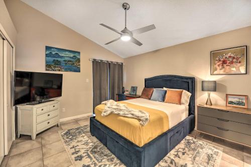 a bedroom with a bed and a flat screen tv at Gorgeous Austin Getaway about 8 Mi to Downtown! in Austin