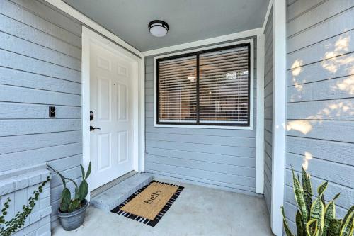 a front door of a house with a window at Gorgeous Austin Getaway with Fire Pit about 8 Mi to Dtwn in Austin