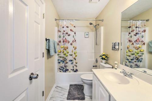 a bathroom with a sink and a toilet and a shower at Welcoming Lawrenceville Family Home with Yard in Lawrenceville