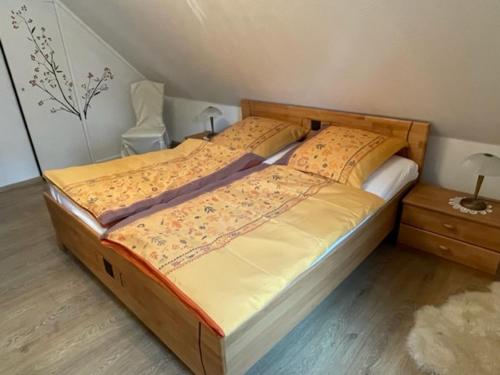 A bed or beds in a room at Ferienwohnung Wilzenbergblick