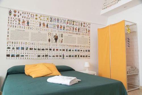 Postel nebo postele na pokoji v ubytování Neapolitan Style Apartrment